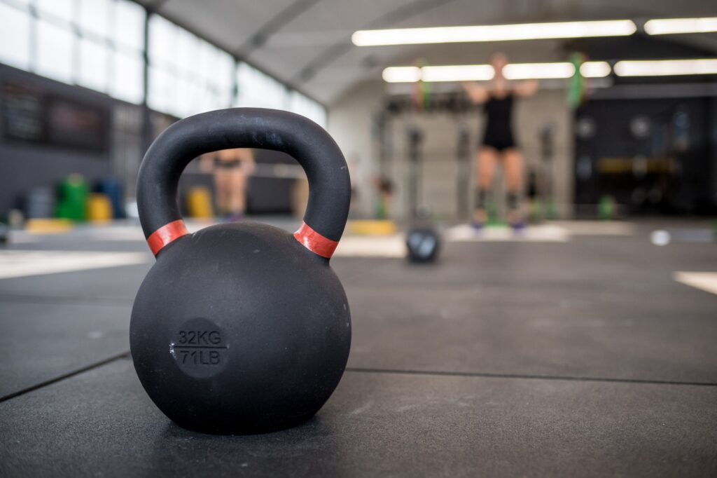Close-up of black kettle bell for training indoors gym