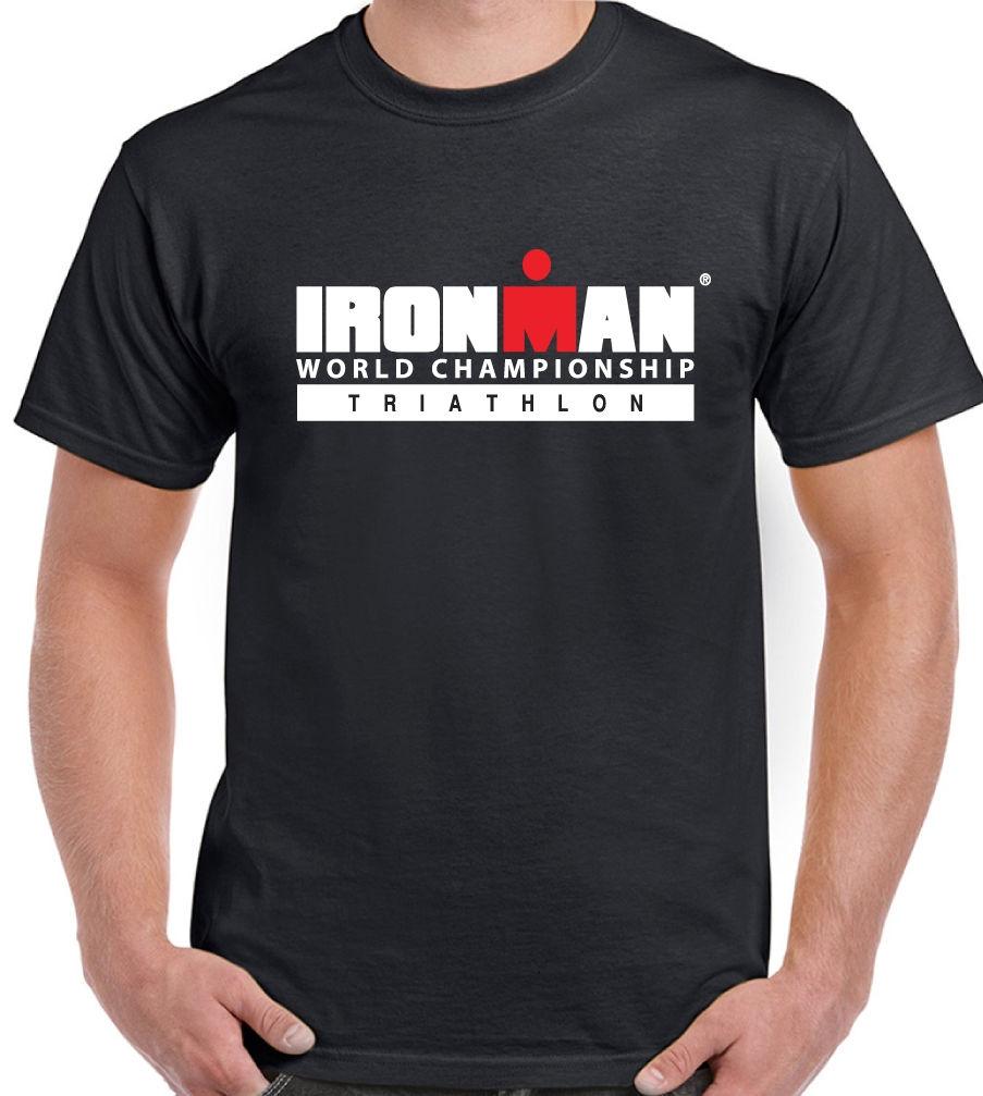Man wearing a black T-shirt with the Ironman World Championship Triathlon logo in white letters and a red emblem on the chest.
